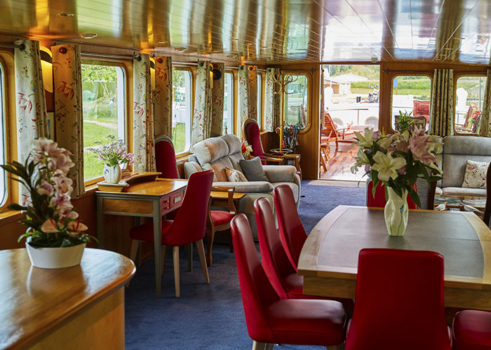 C'est La Vie Luxury Hotel Canal Barge dining area alternative view