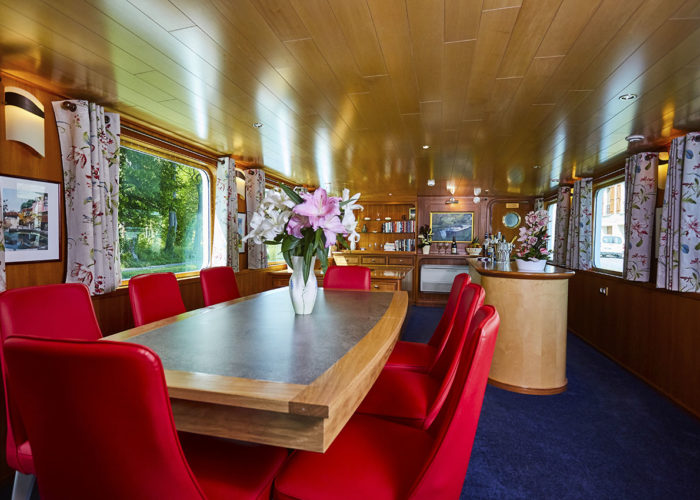 C'est La Vie Luxury Hotel Canal Barge living bar and dining area
