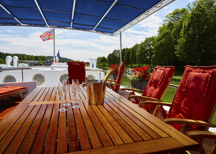 C'est La Vie Luxury Hotel Canal Barge exterior sun deck dining area