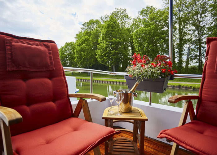 C'est La Vie Luxury Hotel Canal Barge sun deck seating area area